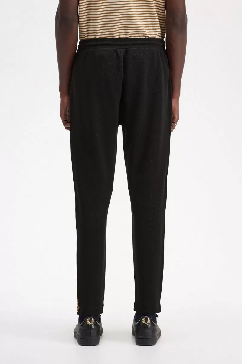 pantalones deportivos fred perry chequerboard tape para hombre color negro