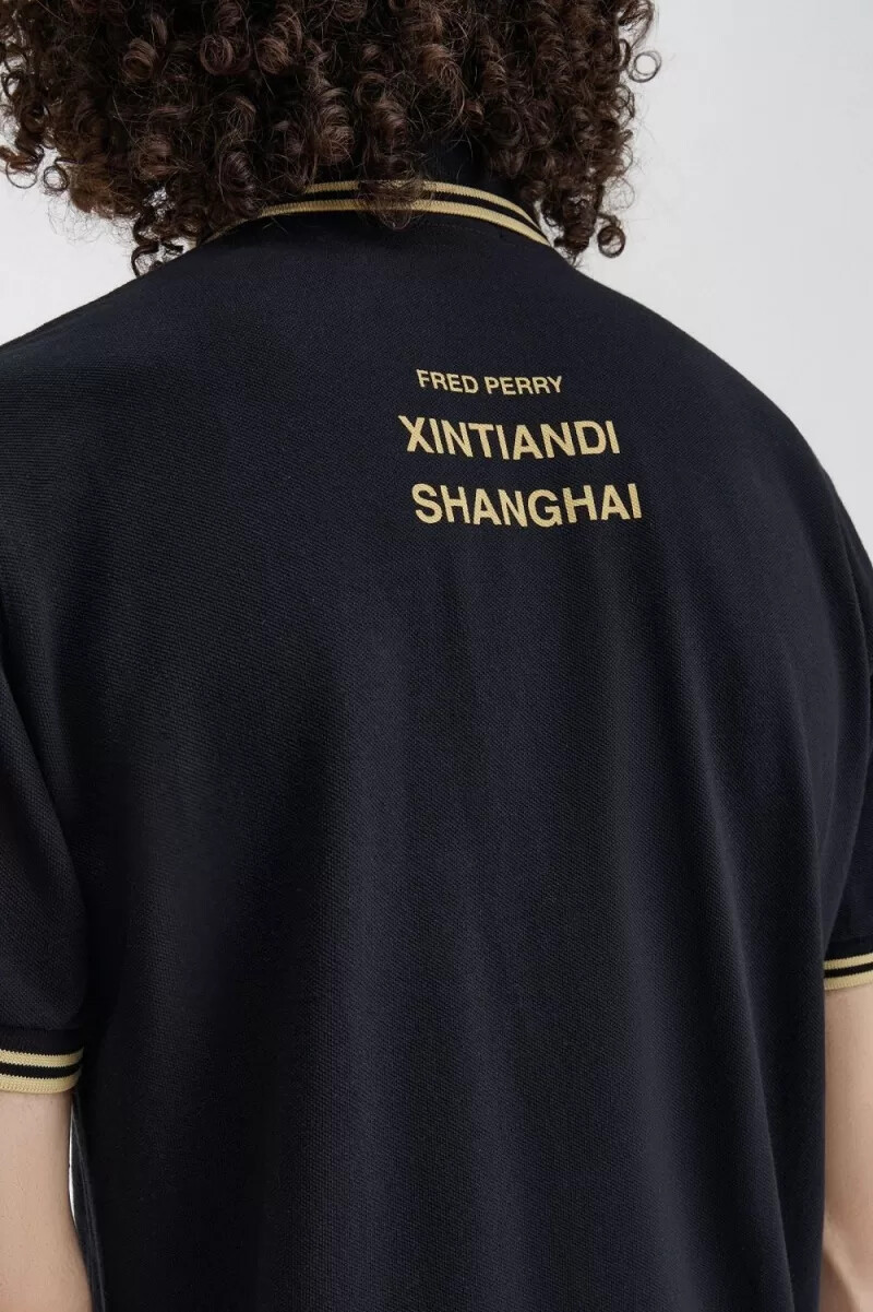 polo fred perry shanghai m12 para hombre color negro champán